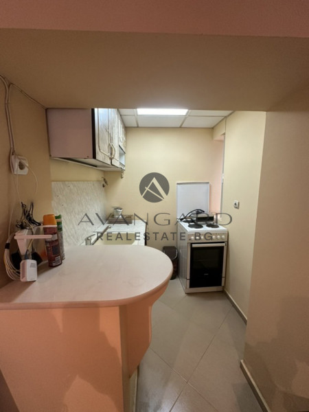 A two -bedroom apartment with a garage and a parking space