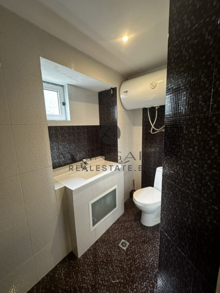 A two -bedroom apartment with a garage and a parking space