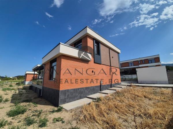 A separate two -storey house in front of act16