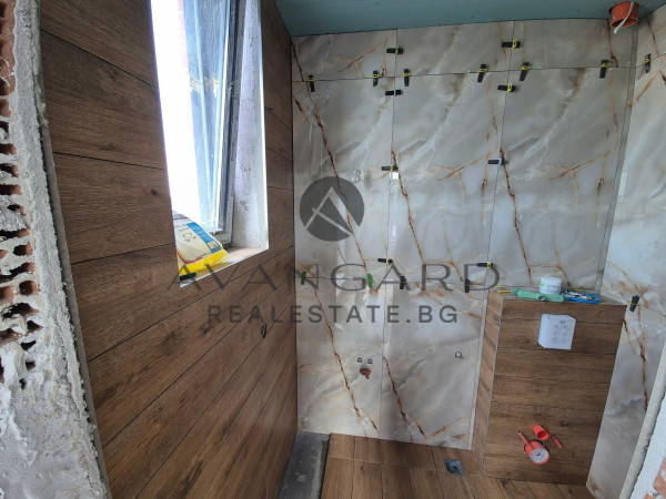 A separate two -storey house in front of act16