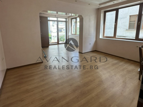 A two -bedroom apartment with a garage and a parking space
