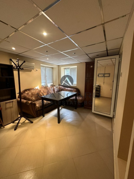 A two -bedroom apartment with a garage and a parking space