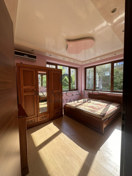 A two -bedroom apartment with a garage and a parking space
