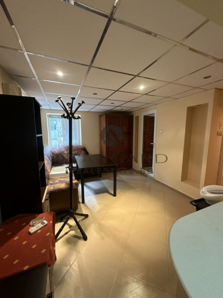 A two -bedroom apartment with a garage and a parking space