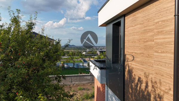 A separate two -storey house in front of act16