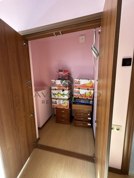 A two -bedroom apartment with a garage and a parking space