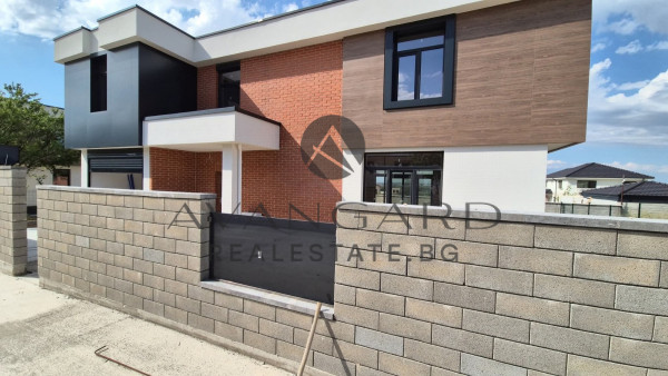 A separate two -storey house in front of act16