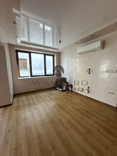 A two -bedroom apartment with a garage and a parking space