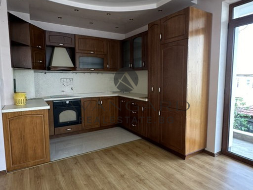 A two -bedroom apartment with a garage and a parking space